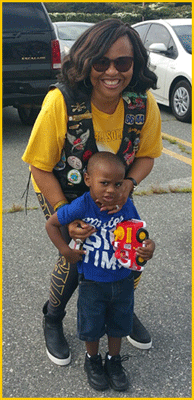 Sickle Cell associate Janice with child